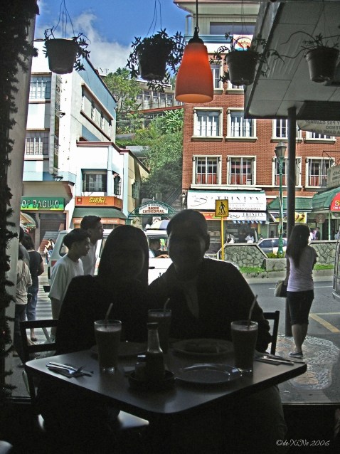 Pizza Volante (Session Road) 2006 Karla and Xine with Pizza Volante view from the wide window