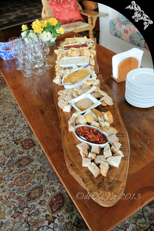 Mama's Table 2013 Mama's Table board of bread, crostini, chicharon, lime Tostitos, pate foie gras, artichoke mozzarella & parmesan spread, semi cured tomato w/chorizo, smoked bangus mousse, chili con carne