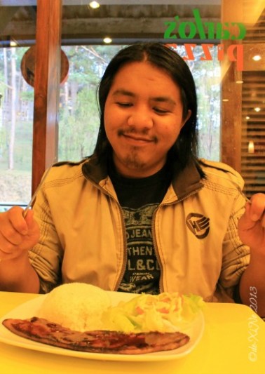 Carlos Pizza Camp John Hay Baguio Race preparing to feast on his bacon of liempo/spareribs 2013